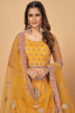Load image into Gallery viewer, Mustard Color Wedding Wear Thread Embroidered Work Captivating Lehenga With Dupatta In Net Fabric
