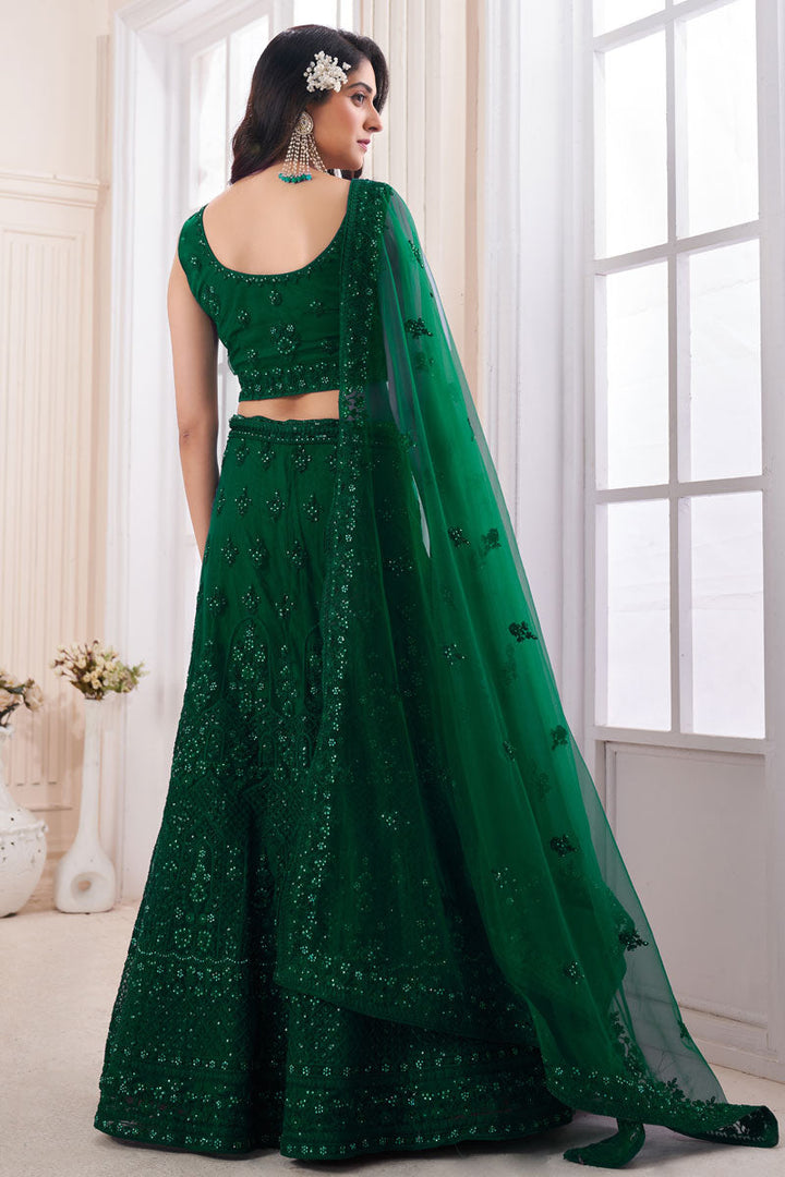 Dark Green Wedding Wear Lehenga Choli In Net Fabric