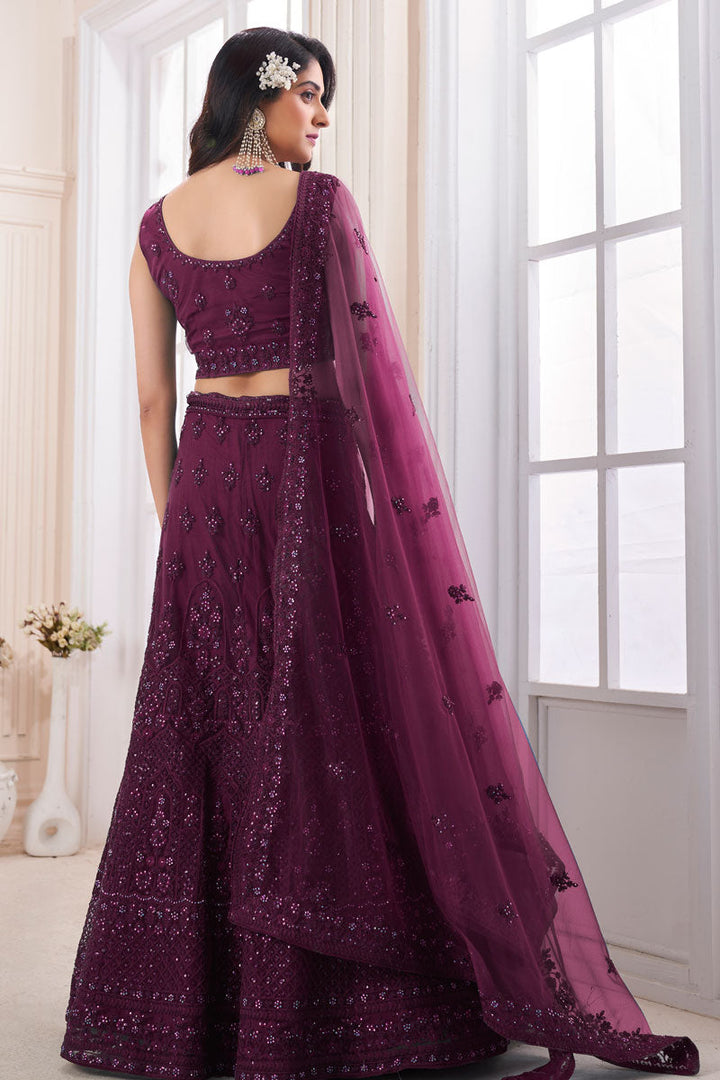 Wine Wedding Wear Net Fabric Lehenga Choli