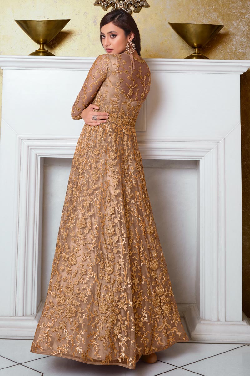 Sangeet Wear Chikoo Color Elegant Embroidered Gown Style Anarkali Suit In Net Fabric