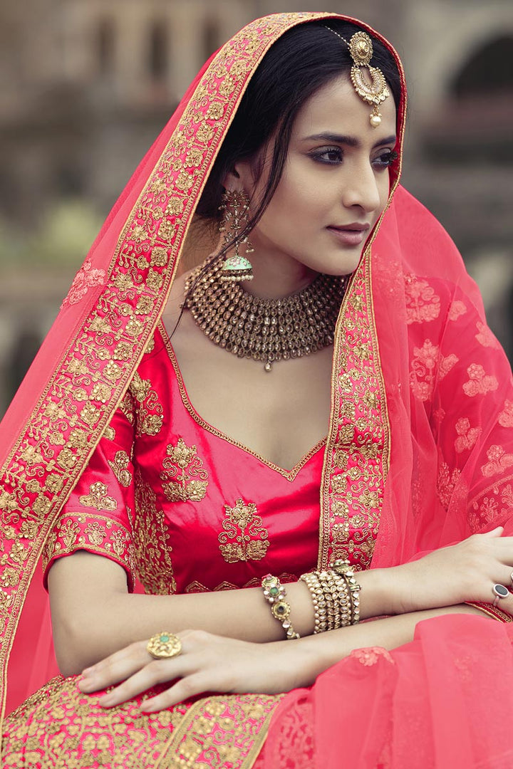 Designer Wedding Lehenga In Rani Embroidered Satin Fabric