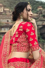 Load image into Gallery viewer, Designer Wedding Lehenga In Rani Embroidered Satin Fabric
