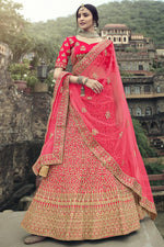Load image into Gallery viewer, Designer Wedding Lehenga In Rani Embroidered Satin Fabric
